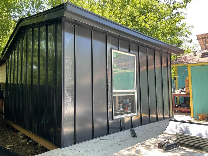 Black standing seam metal wall panels for Metal Roof Installation in Swartz Creek