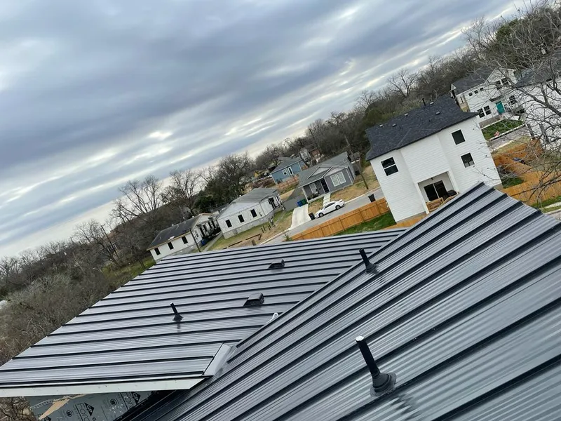 Standing seam metal roof panels with vents for Skylight Repair in Swartz Creek